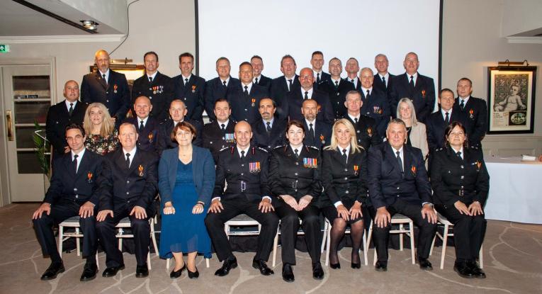 Recipients of long service medals and awards gathered with Chief Fire Officer, Deputy Chief Fire Officer and Police, Fire and Crime Commissioner for Essex