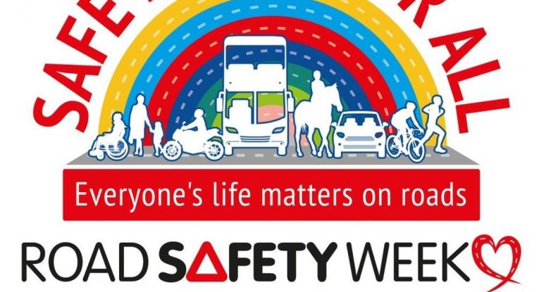 Safer roads for all logo - a rainbow with different modes of transport and the text 'Safe roads for all. Everyone's life matters on roads. Road safety week 14 - 20 November 2022'.