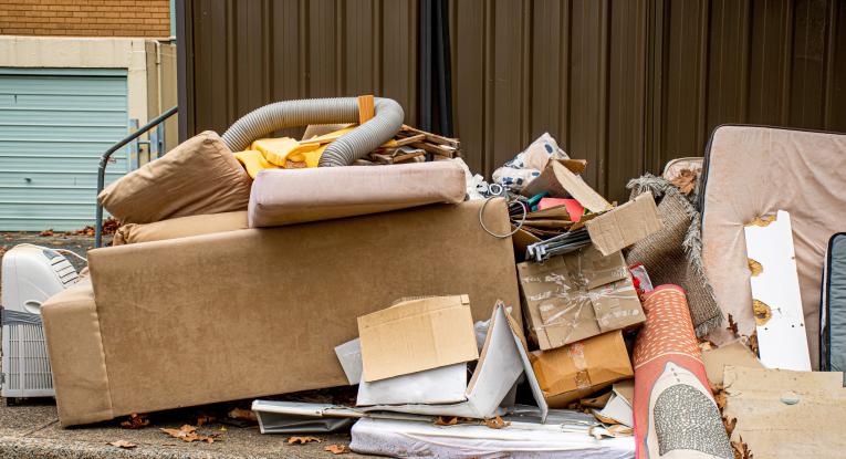 Photo of piles of rubbish and furniture