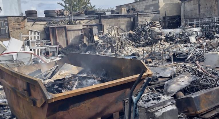 Damaged scrap yard after fire