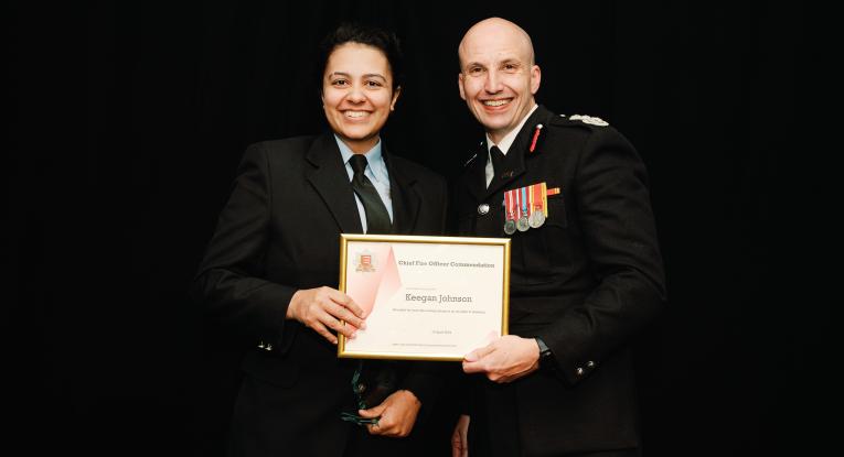 Firefighter Keegan Johnson with Chief Fire Officer Rick Hylton