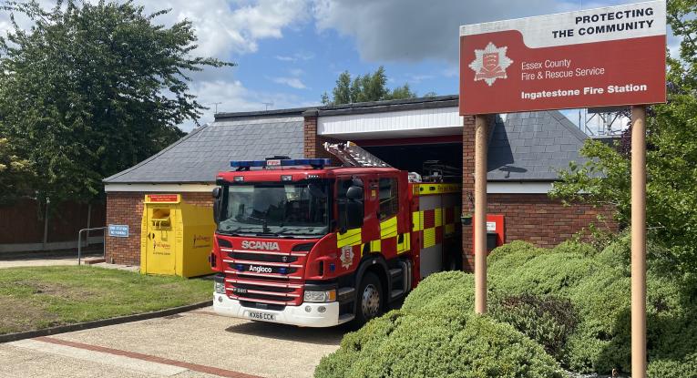 Ingatestone fire station, with a fire engine parked out the front and the sign at the front of the photo